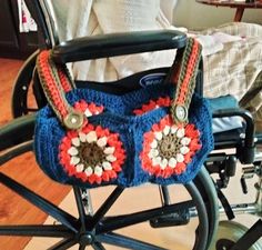 a handbag sitting on top of a wheel chair