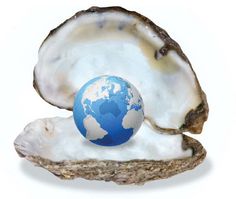 an open oyster shell with a blue and white globe in it that says the world is your oyster