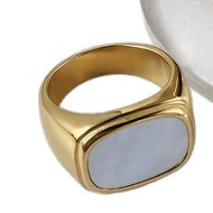 Introducing the Marcus ring, a stunning piece of jewelry that exudes elegance and sophistication. Crafted with meticulous attention to detail, this ring features a stately design that is sure to turn heads. Made with 18k gold plating, it has a luxurious look and feel that will elevate any outfit. But the Marcus ring is more than just a pretty accessory. It's also built to last, with tarnish and water resistance that ensures it will remain in pristine condition for years to come. Whether you're w Luxury Gold Plated Engraved Ring For Formal Occasions, Luxury Tarnish-resistant Rings For Formal Occasions, Luxury Tarnish Resistant Rings For Formal Occasions, Elegant Gold Plated Engraved Ring With Polished Finish, Gold Plated Crystal Ring For Formal Occasions, Gold Crystal Ring With Polished Finish For Formal Occasions, Elegant Gold Crystal Ring With Polished Finish, Elegant Wedding Crystal Ring Tarnish Resistant, Elegant Gold Oval Crystal Ring