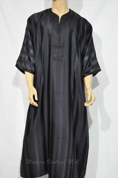 Moroccan kAFTAN for men, oriental kaftan, All sizes are Available Beautiful Moroccan kaftan in cotton for men. This Moroccan clothing is handmade in soft fabric cotton. This kaftan is very pleasant to wear mainly in summer, at the beach, after a spa, indoor, outdoor, at a party... Very fast to wear, not stick to the skin, this kaftan is a really must have clothing. - Cotton - embroidery - Machine washing return policy I check myself each product and sell only the best quality products in any cas Black Ceremonial Kaftan For Eid, Traditional Black Agbada For Ceremonies, Black Kaftan For Eid And Traditional Ceremonies, Black Thobe For Eid And Traditional Ceremonies, Long Ceremonial Thobe With Dabka, Traditional Black Thobe For Eid, Blue Kaftan Men, Classic Kaftan For Men, Kafni Pajama For Men