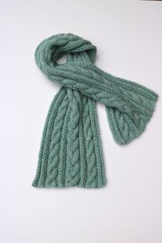 100% Wool Scarf  Colour is pale mint. 61 x 14 inch   Hand knit in Vancouver, British Columbia, Canada  during the snowy winter season. Knit A Scarf, Cable Scarf, Wool Accessories, Yarn Gifts, Cable Knit Scarf, Snowy Winter, Crochet Clothing, Vancouver British Columbia, Fall Scarves