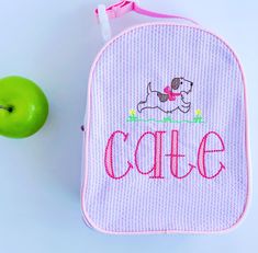 As a former teacher, I know how easily lunchboxes get lost! Say no more to losing a lunchbox with these adorable monogrammed seersucker lunchboxes. The 10" x 8" x 4" insulated lunchbox is available in 7 different colors. Has a mesh pocket on the inside and a buckle on the handle making it easy to hook onto a backpack or diaper bag!  Personalize with a name or monogram. Add a motif or frame to make it one-of-a-kind. If there is a motif that you do not see on my list, please message me as I can em Cute White Lunch Bag For School, Cute White School Lunch Bag, Cute Lunch Box For School End Of Year, Cute Lunch Box For End Of School Year, White Lunch Box For Back To School, White Rectangular Lunch Box For School, Cute White Lunch Box For Gift, Rectangular Monogram Canvas Bag With Lock, Cute Rectangular Lunch Box For Daycare