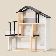 a doll house with all the furniture and accessories in one piece, including windows, doors, and balconies