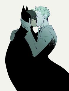 batman and catwoman hugging each other