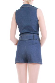 1990s does 70s vintage dark blue stretch denim romper with a chunky wide adjustable belt, wide-set collar, short length and slimming lines. Zips up the front. Unlined. Appears completely unworn! https://www.kcovintage.com https://www.kcovintage.etsy.com • designer: timing usa • era: 1990s • origin: usa • fabric: cotton spandex blend denim • color: dark blue • care: gently hand wash in cold water, hang up to air dry away from sunlight • condition: like new without tags * all measurements taken wh Vintage Denim Dark Wash Jumpsuits And Rompers, Retro Dark Wash Denim Jumpsuit, Blue Fitted Vintage Denim Jumpsuit, Vintage Medium Wash Denim Shortalls, Vintage Medium Wash Button-up Denim Top, Belt Wide, Denim Color, Denim Romper, Vintage Belts