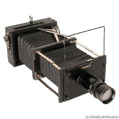 an old fashioned camera is shown on a white background