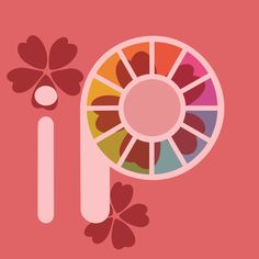 the color wheel is next to a brush and flower petals on a pink background with an orange shadow