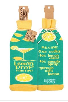 two bottles of lemon drop martini with tags on them