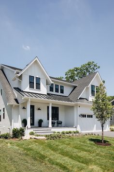 a large white house with two story windows