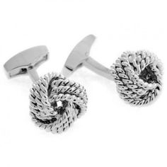 Silver wire cufflinks hand twisted to form a round cable knot. Knot cufflinks finished in silver colored rhodium plating. A new twist on the Tateossian knot cufflinks. Each cufflink is hand twisted to form a round cable knot. Finished in silver-colored rhodium plating and set with a signature Tateossian white tale, this exquisite pair will bring style and class to every outfit. Handcrafted Tateossian collections are known for their clean modern lines and novel designs Complete with gift box for Designer Cufflinks, Silver Cufflinks, Cufflinks Men, Modern Jewelry, Timeless Classic, Silver Wire, Luxury Jewelry, Amazing Jewelry, Luxury Design