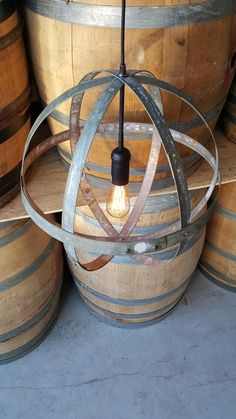 a light that is inside of some wooden barrels