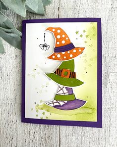 a card with a witch's hat on it