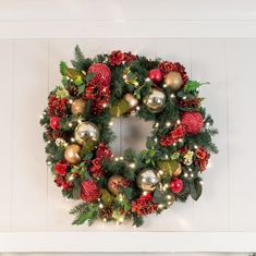 a christmas wreath hanging on the wall