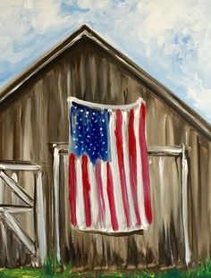 a painting of an american flag on a barn