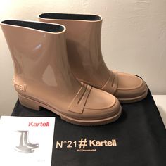 Kartell N21 Loves Kartell Rain Boots Pale Pink N21 Loves Kartell Rain Boots From N21. Made In Italy Composition Outer: Pvc 100% Lining: Pvc 100%, Polyester 100% Sole: Rubber 100% Product Measurements Sole Height 0.6 In Height 5.9 In Heel 1.2 In Circumference 12.2 In Winter Rain, Pale Pink, Winter Boot, Rubber Rain Boots, Rain Boots, In Italy, Composition, Women Shoes, Italy