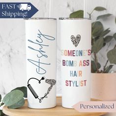 two personalized tumbles are sitting on a table