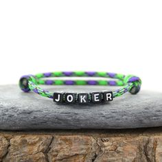 'Simple Adjustable 550 Paracord 'Joker Bracelet' It will fit children & adults alike. Comfortably fitting wrist sizes from around 5.5 inches (14cm) up to 9 inches (23cm) -------------------- § -------------------- All my Bracelets are 'Handmade to Order in the UK' by myself. I aim to supply you as quickly as possible with a high quality product. Please note that the colour(s) of product(s) received may vary slightly from that displayed on the screen/monitor, due to to variations in screen/monito Survival Items, Paracord Projects, Handmade Uk, 550 Paracord, Paracord Bracelets, Charm Bracelets, Paracord, Arm Band, Rope Bracelet