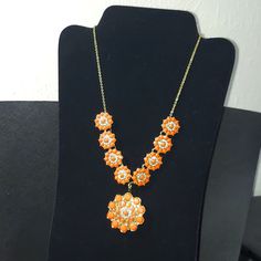 Peach And Diamond Stones Set In Gold Flower Pattern. The Main Larger Charm Is Removable To Wear On A Separate Chain Alone Or Even To Hold A Scarf. Orange Flower Pendant Necklace For Gift, Orange Flower Pendant Necklace Gift, Handmade Orange Necklace With Flower Pendant, Handmade Orange Flower Pendant Necklace, Orange Beaded Flower-shaped Jewelry, Orange Beaded Flower Jewelry, Orange Flower-shaped Beaded Jewelry, Orange Flower Necklaces As A Gift, Flower-shaped Orange Necklace For Gift