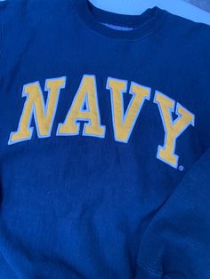 Vintage NAVY Reverse Weave Crewneck Sweatshirt Size Small See pics for measurements Quality Embroidered Letters Pics do not do this justice. Rich Navy Blue material with the yellow embroidered letters are stunning with the quality reverse weave material. Fast shipping. We ship same or next day with USPS priority mail We are a small family business and we appreciate your purchase, Godspeed ! Navy Top With Embroidered Logo For College, Navy Crew Top For College, Navy Crew Neck Top For College, Badgers Logo, College Crewneck Sweatshirts, God Speed, Cowboys Men, Embroidered Letters, Champion Brand