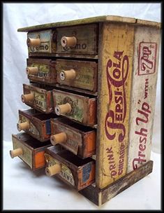 an old wooden box with many drawers