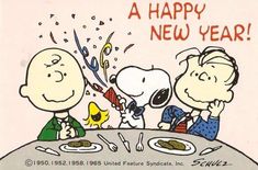 a happy new year card with three cartoon characters sitting at a table