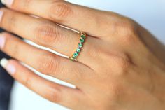 Emerald wedding ring, Stacking ring, Emerald wedding band, Full eternity ring, Zambian Emerald, dainty emerald ring, May birthstone Same design can be made also with other custom gemstones per request. Product details: - Solid gold - approx 2.5mm emerald Ring size - US 3 to US 9 (for smaller or larger ring size, please contact) Please select your size at the drop down menu. All orders will be shipped via DHL or FedEx express shipping. Thanks! Everyday Diamond Ring, Minimal Diamond Ring, Emerald Wedding Band, Grey Diamond Ring, Raw Diamond Rings, Raw Diamond Engagement Rings, May Birthstone Rings, Rough Diamond Ring, Emerald Wedding Rings