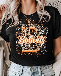 The perfect way to get your favorite Bobcats team on a t-shirt is with a DTF transfer! DTF stands for direct to film, and it's the easiest way to put a heat transfer design onto your shirt. All you have to do is heat press on the dtf transfer with some heat and pressure and voila - you've got your very own Bobcats t-shirt in no time! The dtf transfer material is incredibly durable and has amazing vibrancy for colors, giving you the perfect way to show off your Bobcat pride in style. All you need Tiger Spirit, Football Homecoming, School Spirit Shirts, Heat Transfer Design, Cricut Craft, Spirit Shirts, Shirts Design, School Spirit, Shirt Ideas