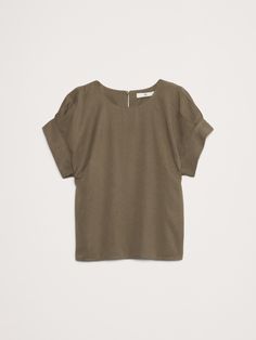 We cut this relaxed top with hidden pleats at the cuffs to create an almost-puffed sleeve silhouette.  For fabric, we reached for one of our favorite all-season twills, woven from silky soft Tencel™ lyocell and breathable cotton.  Relaxed fit.  Sustainability: Made with TENCEL™ lyocell, a sustainably sourced fiber from responsibly-harvested trees.  Crew neck with button-keyhole at back.  Straight hem.  Unlined.  Relaxed fit.  Short sleeves.  Hip length.  Model: Size S, 5'10" (178cm). Classic Tops With Rolled Sleeves For Casual Gatherings, Chic Viscose Tops With Shirttail Hem, Chic Viscose Top With Shirttail Hem, Fall Tops With Cuffed Sleeves And Relaxed Fit, Rolled Sleeves Tops For Casual Gatherings In Fall, Spring Relaxed Fit Tops With Cuffed Sleeves, Rolled Sleeve Tops For Casual Gatherings In Fall, Chic Blouse With Cuffed Sleeves For Everyday, Casual Solid Tops With Blouson Sleeves