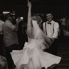 a bride and groom dancing at their wedding reception