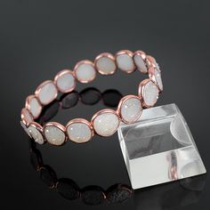 "GemFormingStudio D E T A I L S White Druzy Bangle | Multi Gemstone Bangle | Cute Bangle | Handmade Bangle | Bangle For Women | Bangle For Her, Gift For Women, Gift For Her Stone Size: 10 mm Weight: 15.98 gm Length: 2.5\" Aprx. Color: Rose Gold Material: Brass Polish: All Polish Available . Contact us for wholesale prices. R I N G S https://www.etsy.com/in-en/shop/GemFormingStudio?section_id=22783374 B E A D S https://www.etsy.com/in-en/shop/GemFormingStudio?section_id=22828835 W A N D S https:/ Adjustable Rose Gold Crystal Bangle Bracelet, Rose Gold Bangle Bracelets For Jewelry Making, Adjustable Stackable Crystal Bracelet, Adjustable Stackable Round Crystal Bracelet, Hypoallergenic Rose Gold Bangle Bracelet, Adjustable Rose Gold Round Crystal Bracelet, Round Hypoallergenic Rose Gold Bracelets, Adjustable Round Rose Gold Crystal Bracelet, Hypoallergenic Round Rose Gold Bracelets