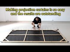 a man kneeling down on top of a floor with the words making projection curtains so easy and the results are outstanding