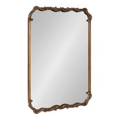 an ornate gold framed mirror on a white background