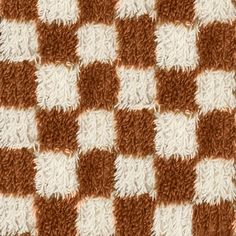 a brown and white checkerboard pattern is shown