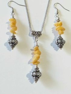 Yellow Quartz Silver jewelry set Victorian silver set yellow quartz earrings necklace Bohemian set silver jewelry set boho jewelry set gift Victorian set silver-tone jewelry set yellow quartz set earrings and necklace Bohemian set filigree jewelry set Edwardian jewelry set boho jewelry set antique style jewelry set. Victorian yellow quartz set Bohemian earrings necklace Bohemian filigree necklace and earrings Edwardian set silver tone beautiful ornament yellow quartz set.  Set Victorian yellow q Yellow Dangle Necklaces As Gifts, Yellow Jewelry With Matching Earrings For Gifts, Amber Spiritual Dangle Jewelry, Handmade Amber Metal Jewelry, Handmade Yellow Jewelry Sets As A Gift, Spiritual Citrine Gemstone Beaded Jewelry, Yellow Spiritual Round Jewelry, Spiritual Citrine Gemstone Beads Jewelry, Bohemian Amber Sterling Silver Necklace