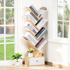 a bookshelf made out of wood stands next to a window