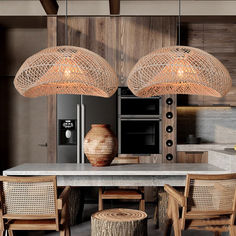 a kitchen with wooden chairs and lights hanging from the ceiling