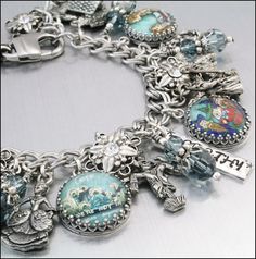 Wizard of Oz Jewelry Silver Charm Bracelet by BlackberryDesigns, $87.00 Whimsical Silver Dangling Charms, Themed Silver Jewelry With Charms, Whimsical Nickel-free Silver Charm Bracelet, Whimsical Silver Charm Bracelet, Collectible Themed Silver Jewelry, Themed Silver Jewelry With Dangling Charms, Whimsical Silver Bracelet Jewelry, Themed Silver Collectible Jewelry, Whimsical Silver Jewelry With Vintage Charm