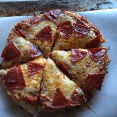 a pepperoni pizza cut into eight slices