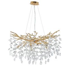 an elegant chandelier with gold and crystal leaves hanging from the ceiling, against a white background