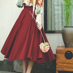 A wine-colored retro skirt that seems to be filled with a rich aroma. 
The high-waisted construction and wide waistband give it a vintage feel.
 Pair it with a retro blouse to look like a coffee-loving lady in the afternoon.



 <Size>



 S size






 Total length: 73cm

 Waist: 64-68cm




 M size



 Total length: 76cm

 Waist: 68-72cm











 <Material>



 polyester








 <Model worn>



 Wearing size



 M size




 model dimensions



 Height: 169cm

 Weight: 52kg









 <Oth Elegant Burgundy Pleated Skirt, Elegant Lined Burgundy Skirt, High Waist Retro Pleated Skirt, Elegant Burgundy Midi Skirt, Vintage Brown Flowy Skirt, Retro High Waist Relaxed Skirt, Vintage Brown Skirt For Party, Elegant Burgundy Skirt For Spring, Chic Burgundy Midi Skirt