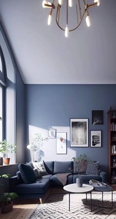 a living room filled with furniture and a chandelier hanging from the skylight