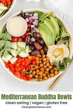 two bowls filled with different types of salads and dressing on top of each other