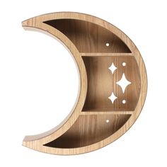 a wooden shelf with two shelves in the shape of a crescent and stars on it