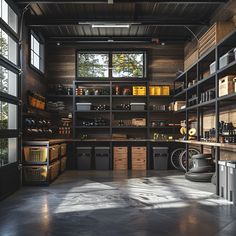 an industrial kitchen with lots of shelves and cabinets