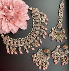 This is a beautiful Choker that comes with a set of earrings and maangtika. Can be worn on any outfit or for a bridal look as its a complete set. Comes in 2 colors - Pastel Pink and Beige Pastel Kundan Jewellery, Pink Desi Jewelry, Pink Kundan Necklace With Mirror Work For Wedding, Pink Wedding Jewelry With Mirror Work, Pink Indian Jewelry, Pastel Pink Jewelry, Shaadi Jewelry, Bridal Indian Jewelry, Desi Jewellery