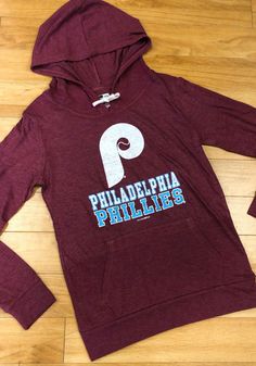 Philadelphia Phillies Womens Maroon Tri-Blend Draw String Hooded Sweatshirt Sports Fan Apparel Top With Drawstring Hood, Sports Fan Apparel Tops With Drawstring Hood, Hooded Tops For Fan Merchandise, Sports Event Fan Apparel Tops With Drawstring Hood, Fan Apparel Tops With Drawstring Hood For Sports Events, Fan Gear Hooded Top With Letter Print, Team Spirit Tops With Drawstring Hood For Streetwear, Fan Merchandise Drawstring Hood Top, Fan Merchandise Hooded Tops With Team Spirit