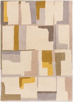 an area rug with various colored blocks on it and a white background in the middle