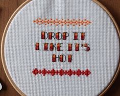 a cross stitch pattern with the words drop it like it's hot