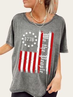 Washed Vintage American Flag Help the People Black Color Cowgirl Tee Shirt Print Tee Black Tops With American Flag Print For Summer, Black Summer Top With American Flag Print, Casual Black Top With Flag Print, Black Flag Print Top For Summer, Black Tops With Flag Print For Summer, 4th Of July Black Short Sleeve Tops, Black Graphic Tee With American Flag Print, Black Patriotic Shirt With Letter Print, Black Cotton Tops With American Flag Print