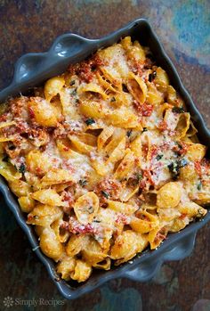 a casserole dish filled with pasta and cheese